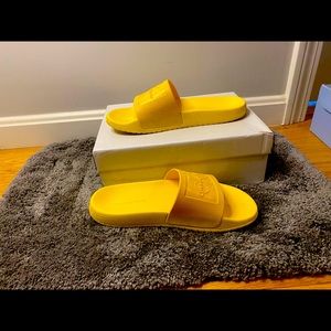 Yellow Calvin Klein Slides